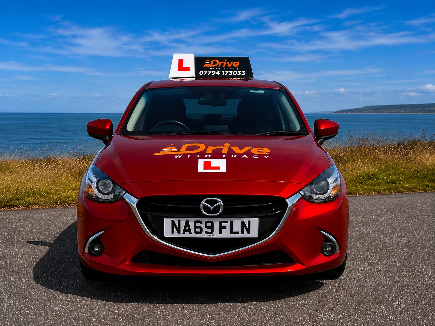 Drive With Tracy training car — rear three-quarter angle